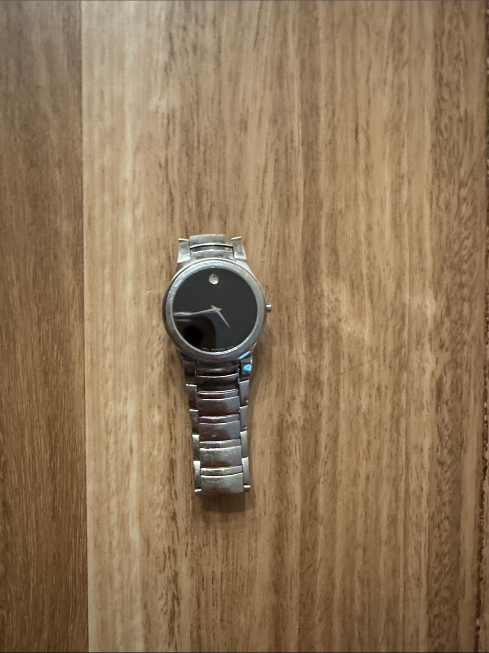 Movado Silver Bracelet Watch with Black Dial